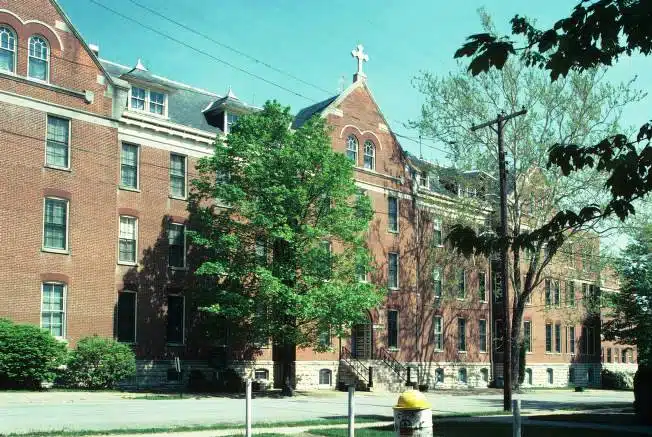 Photo with caption: The Oldenburg monastery as it looked in 1981. Courtesy of Indiana Memory Project, Indiana Historic Architecture Slide Collection, https://digital.library.in.gov.