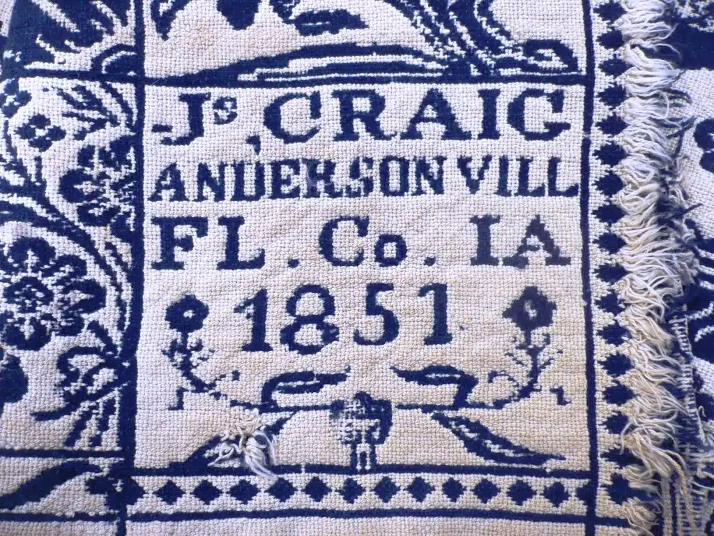 Photo of coverlet with text: Js, Craig. Andersonville.