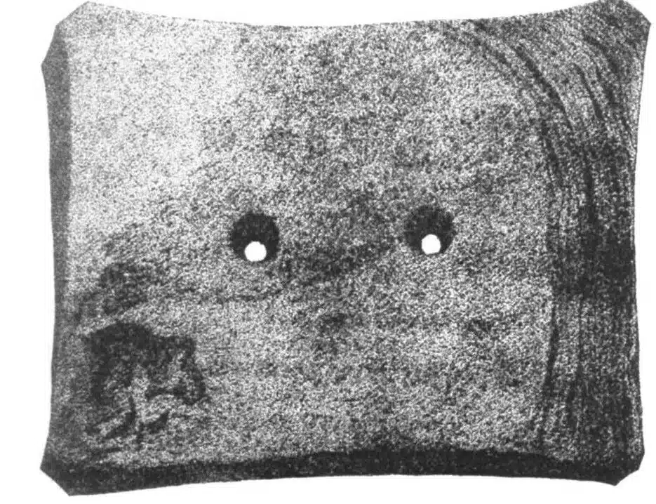 Photo with caption: A slate gorget found during the 1880s excavation of the Glidewell Mound. These were typically worn around the neck. From Dr. Homsher’s report The Glidwell [sic] Mound, Franklin County, Indiana.