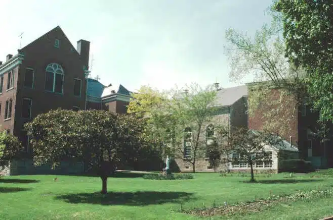 Photo with caption: The rear of the Oldenburg monastery as it looked in 1981. Courtesy of Indiana Memory Project, Indiana Historic Architecture Slide Collection, https://digital.library.in.gov.