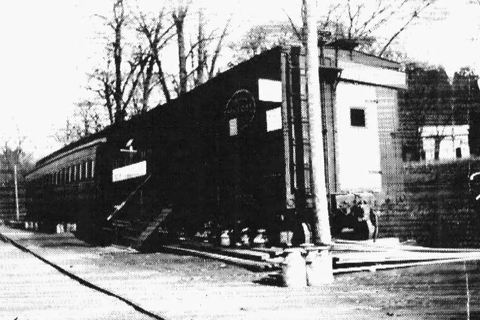 Photo with caption: The temporary depot made out of train cars, which was used for a few months after the 1913 flood.