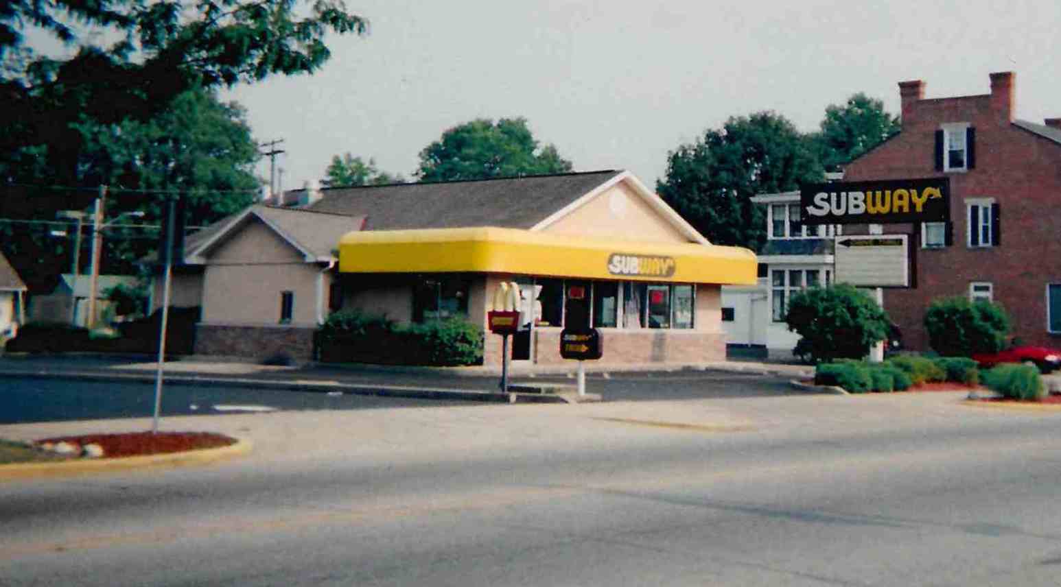 Photo with caption: The Subway sandwich shop in August 2005. This same building was later remodeled into the Mexican restaurant. FCPLD collection.