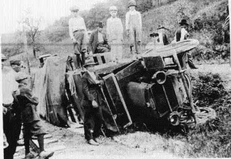 Photo with caption: Auto accident just north of town, along “the Narrows,” when the road was still gravel.