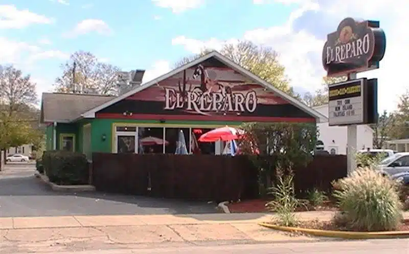 Photo with caption: Remember the outdoor dining area and the horse painting on the gable of El Reparo before they expanded? Franklin County Assessor image.