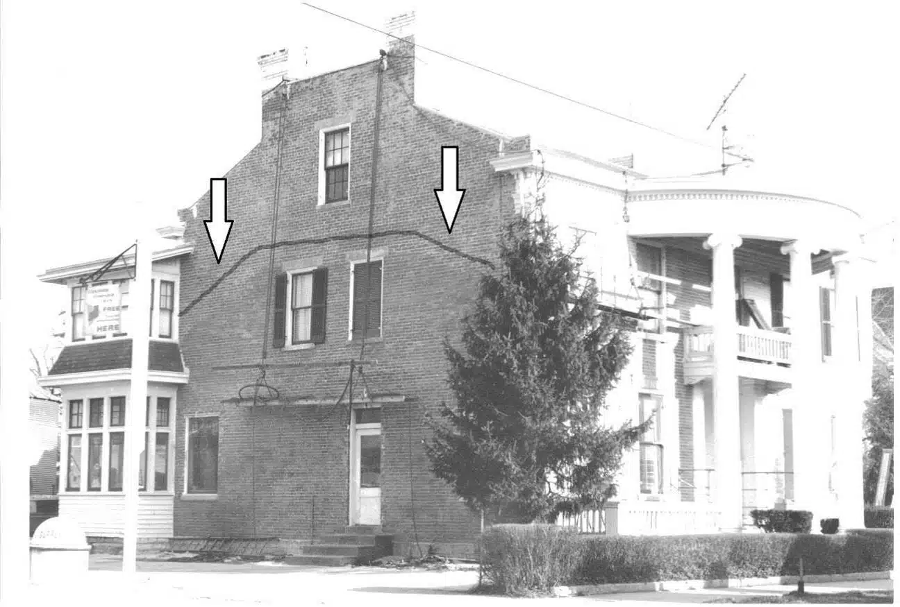 Photo with caption: The Goodwin-Farquhar house during restoration sometime around 1980. A line and two arrows have been drawn to show the faint outline of the original height and roofline of the house. Don Dunaway photo, from the book Brookville Houses and the People Who Lived in Them. There’s lots of good stuff in this book. If you haven’t read it, copies are available from the Brookville Library’s History Department.